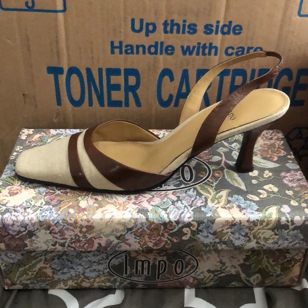 Sling back heel with strap